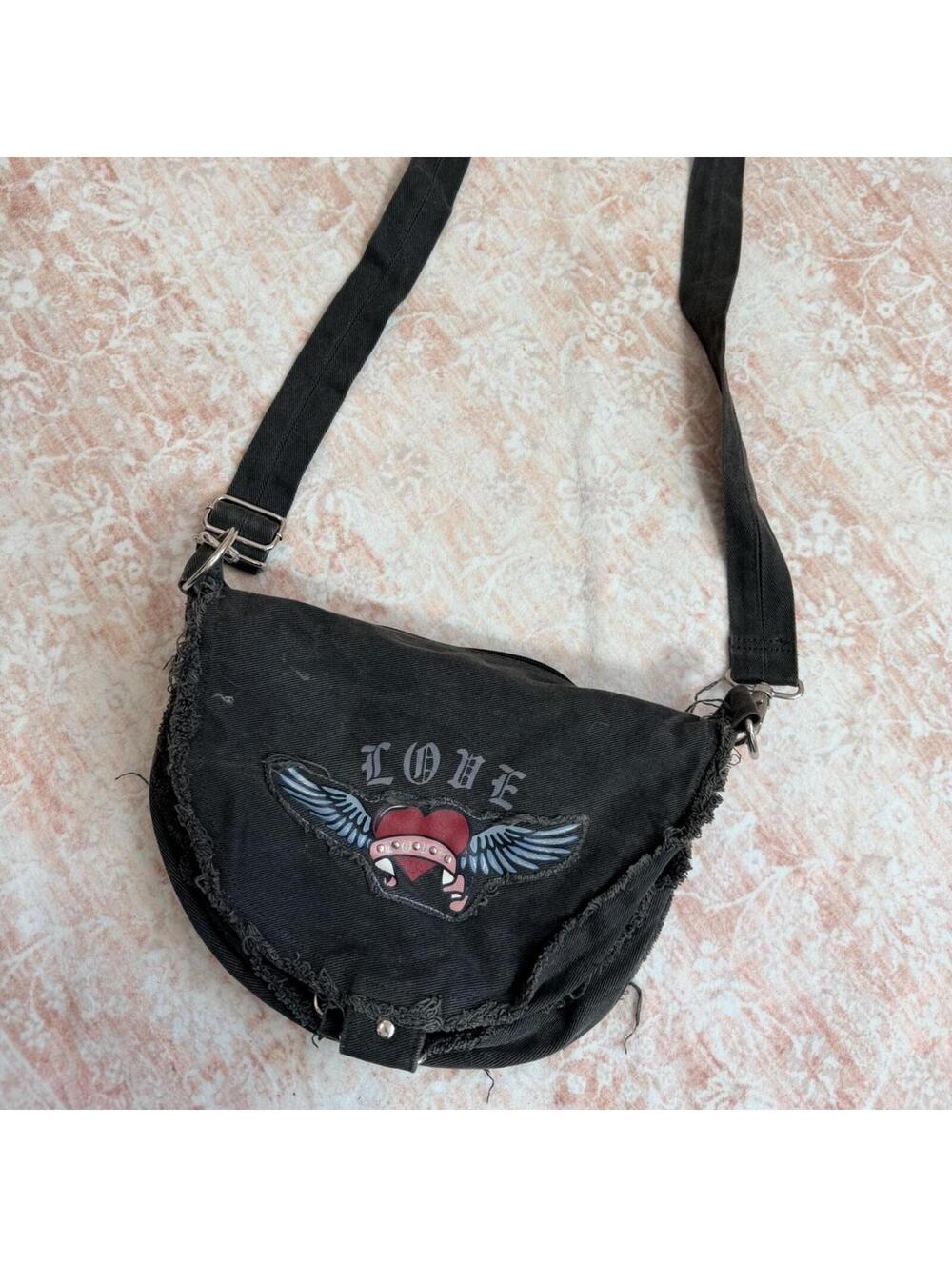 Black distressed shoulder bag